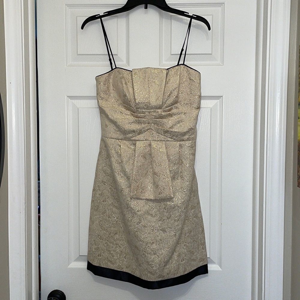 BCBG Paris Gold with black trim cocktail mini dress